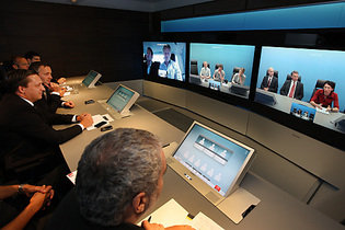 Dr. Hannes Ametsreiter, CEO of mobilkom austria and Telekom Austria, CTO DI Walter Goldenits and journalists at the LTE demonstration in one of the TelePresence rooms by Telekom Austria. Dr. Hannes Ametsreiter, CEO of mobilkom austria and Telekom Austria, CTO DI Walter Goldenits and journalists at the LTE demonstration in one of the TelePresence rooms by Telekom Austria.